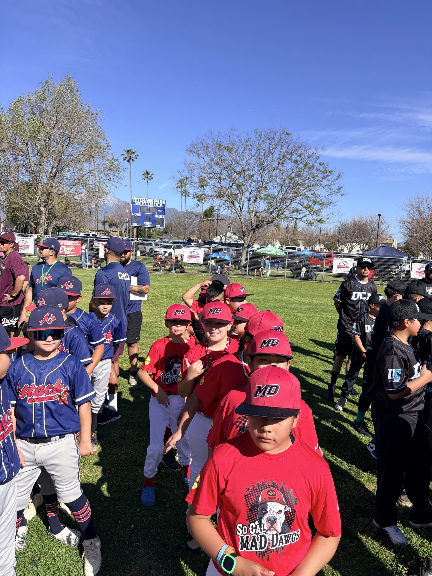 All teams gathered for pregame ceremony at Veterans Park