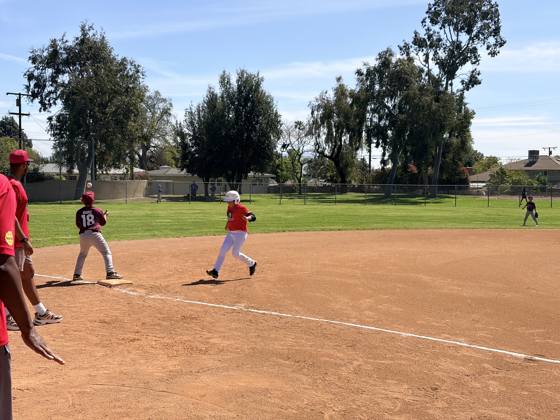 MAD Dawgs runner rounding first base