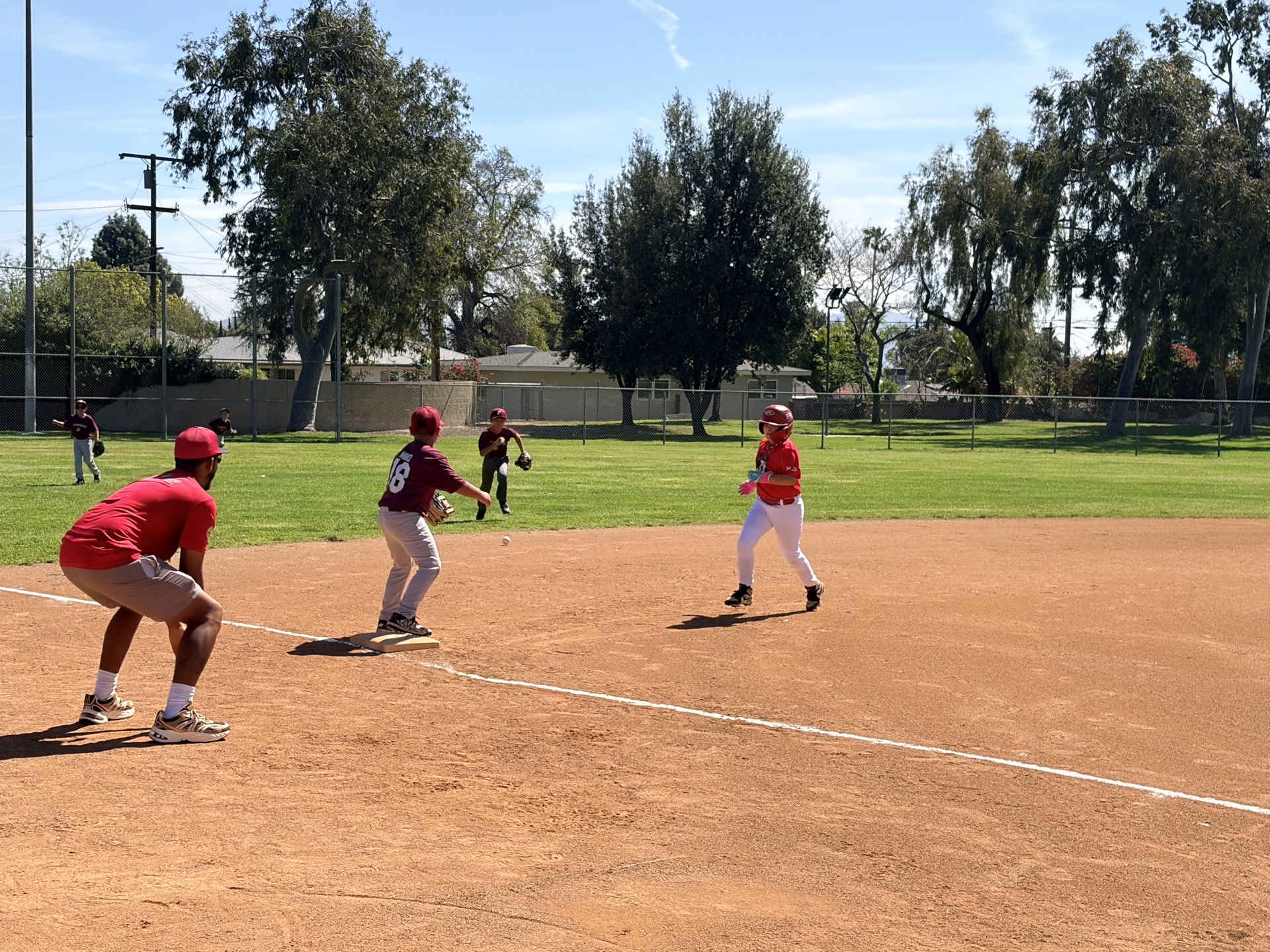 MAD Dawgs runner advancing on a ground ball