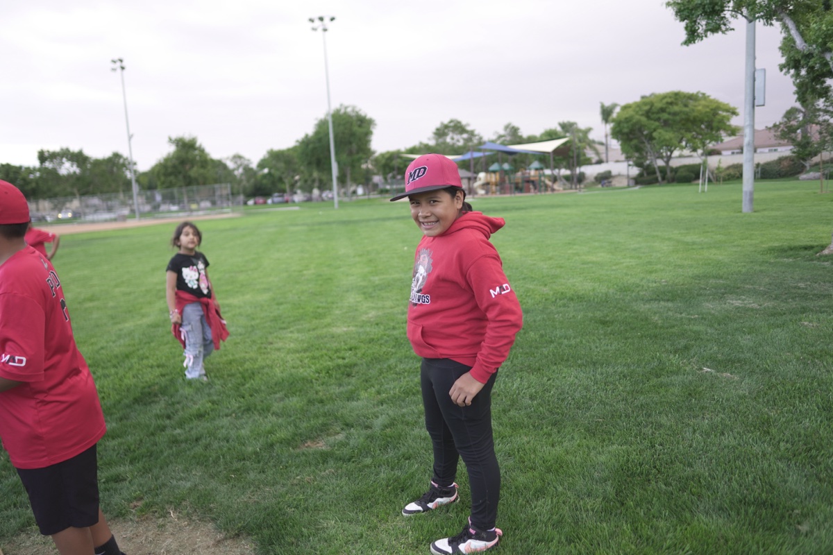 MAD Dawgs player looking back with big smile