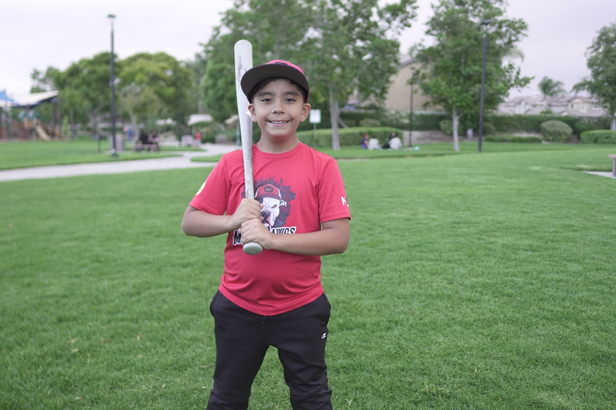 MAD Dawgs player in batting stance